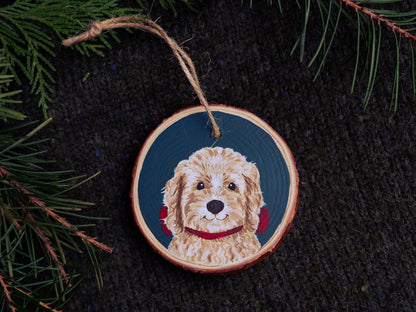 Wooden ornament with a dog painting on a dark fabric background