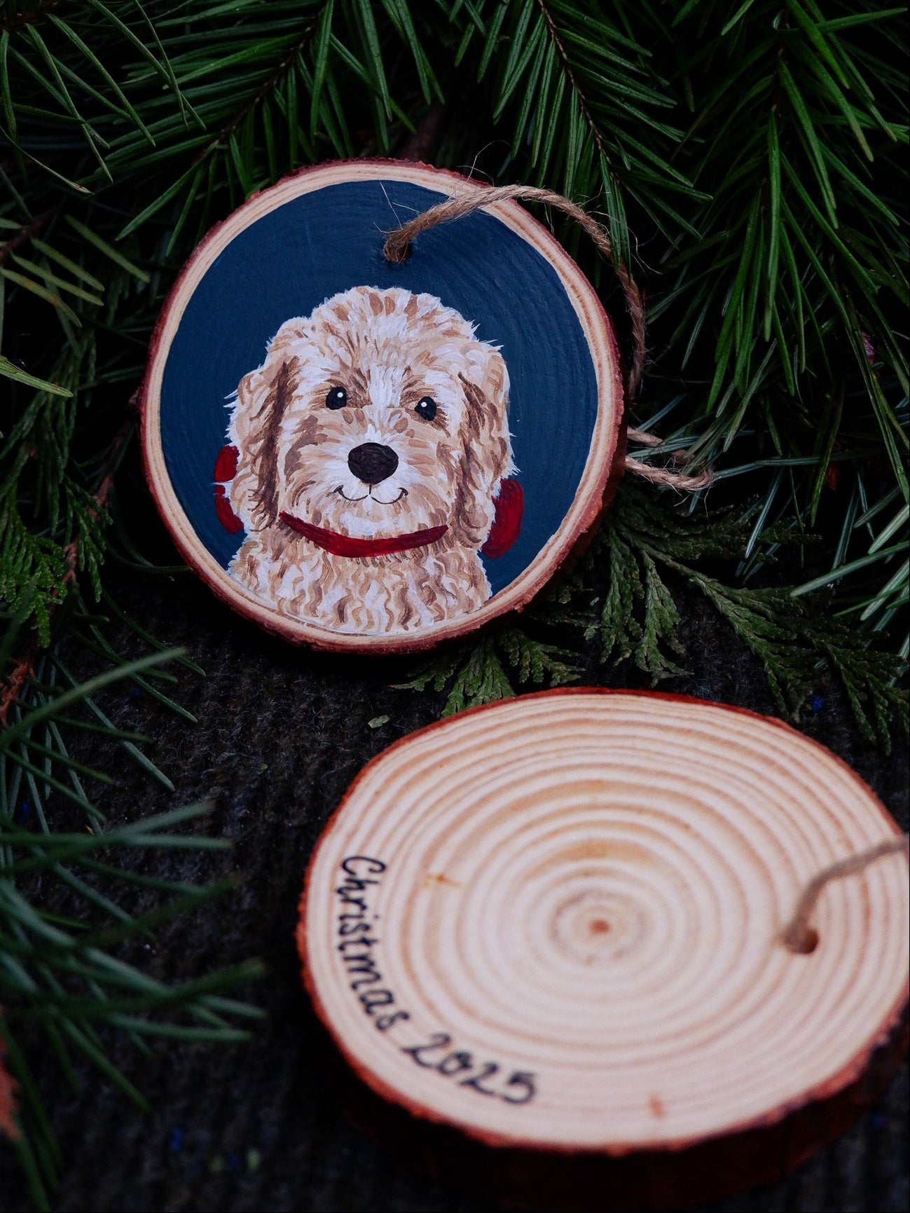 Wooden ornament with a hand-painted dog illustration
