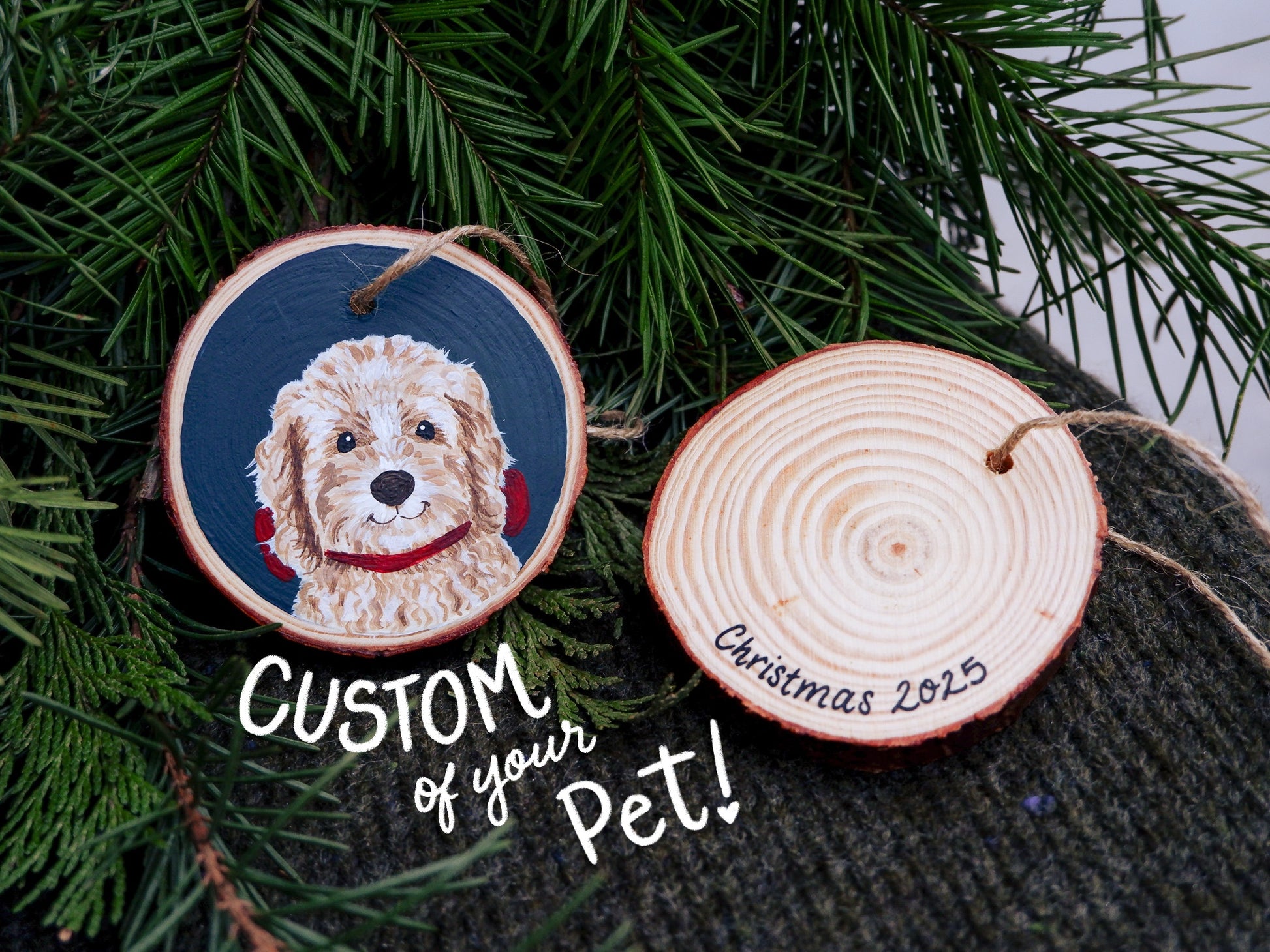 Wooden Christmas ornament with a dog portrait and 'Custom of your Pet!' text, against a green leafy background.
